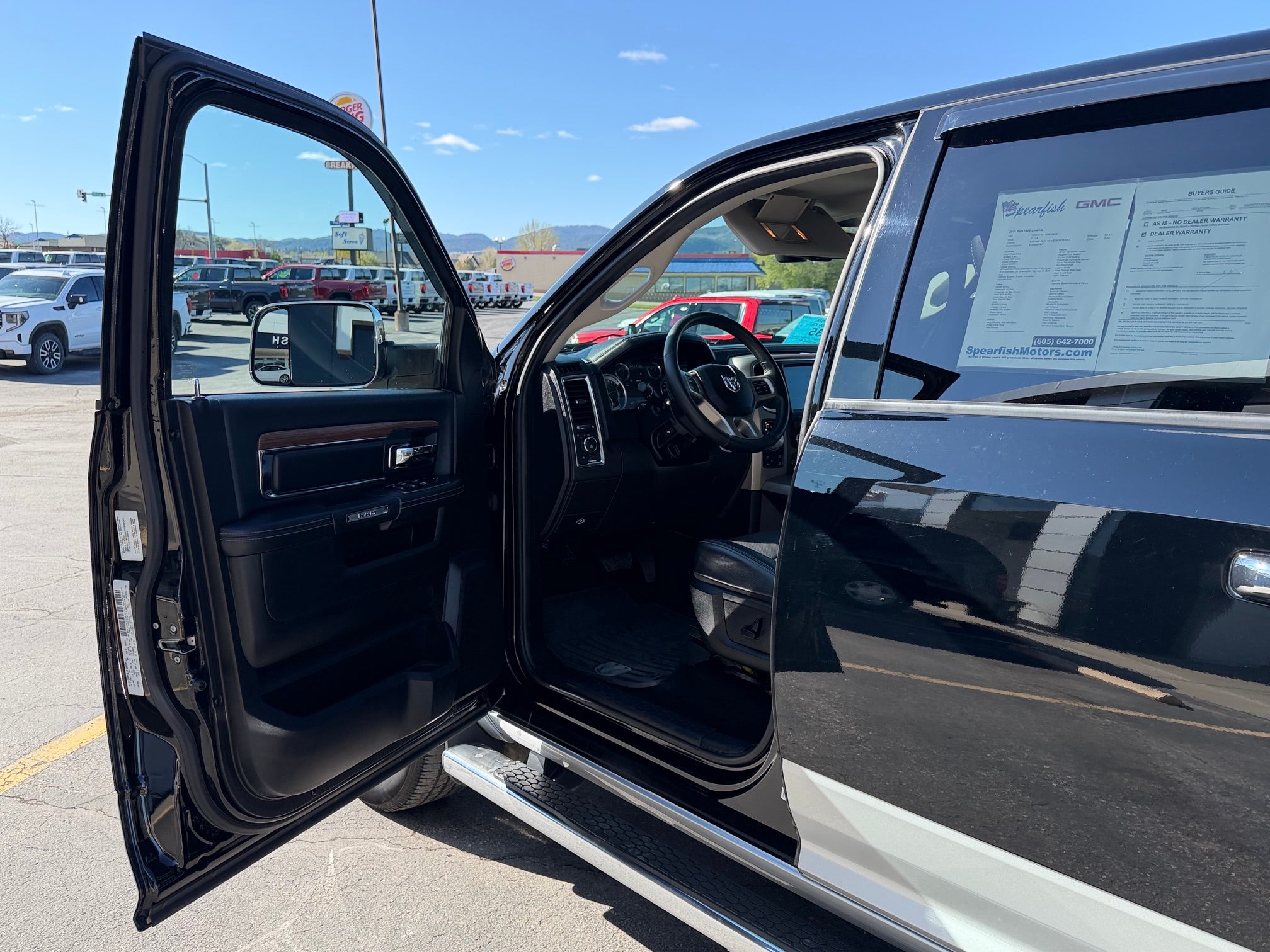 2014 RAM 1500 4WD Crew Cab 5.7 Ft Box Laramie