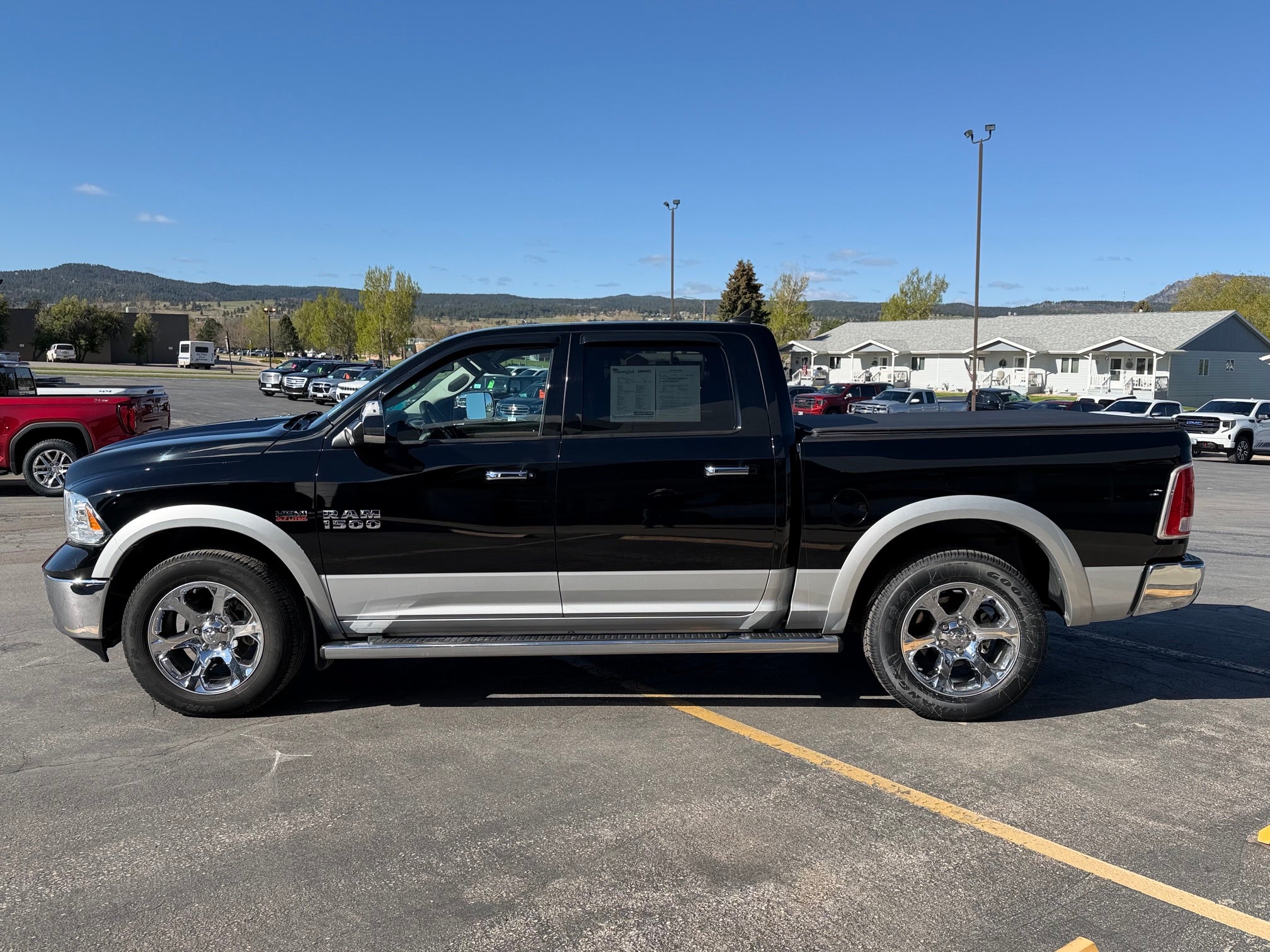 2014 RAM 1500 4WD Crew Cab 5.7 Ft Box Laramie